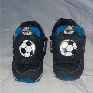 New Balance Black and Blue Soccer Sneakers